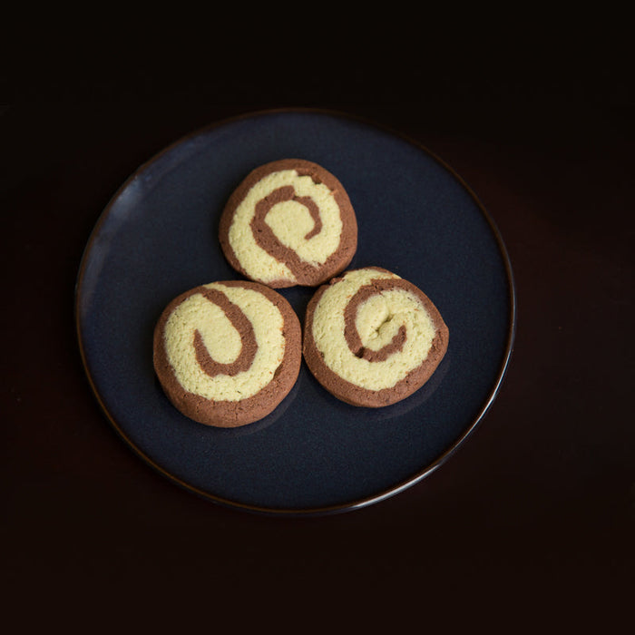 Chocolate and peppermint pinwheel cookies made with Peppermint and Vanilla Spice Drops