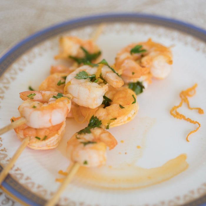 Citrusy spicy prawn skewers made with Spice Drops and fresh coriander