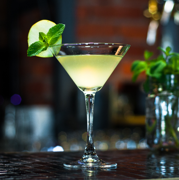 Coconut water and fennel mocktail garnished with lime and mint.