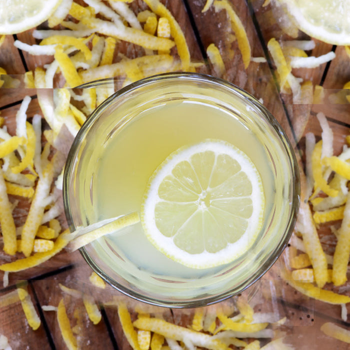 Glass of flavoured lemonade made with Spice Drops and ice