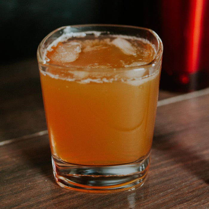 Cardamom Negroni cocktail made with Cardamom Spice Drops, strained over ice.