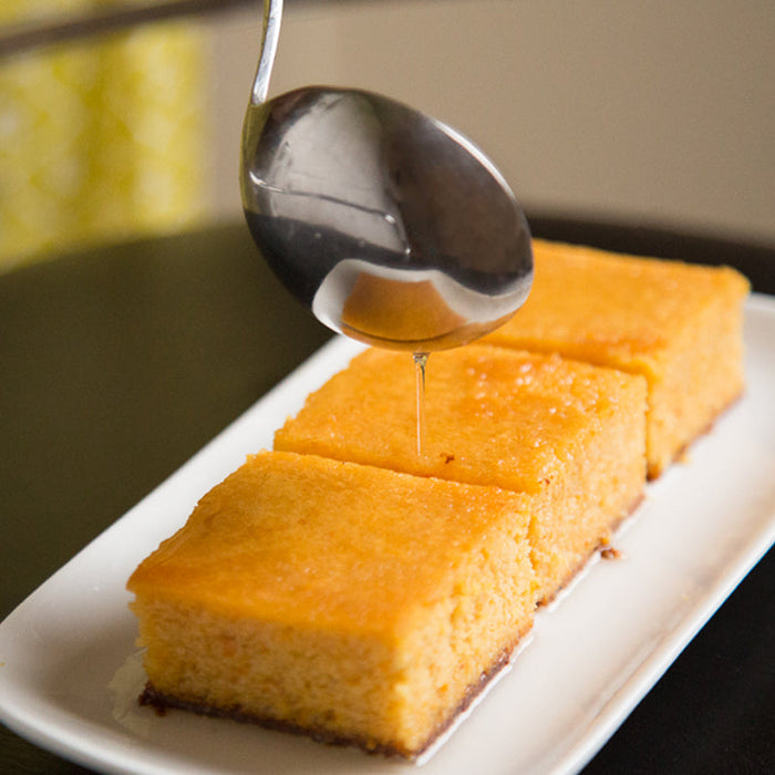 Lemongrass syrup made with Spice Drops, ready to drizzle over cake.