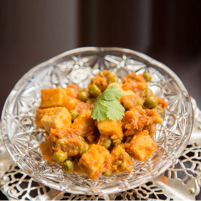 Paneer and peas curry seasoned with Spice Drops, served with rice or naan.