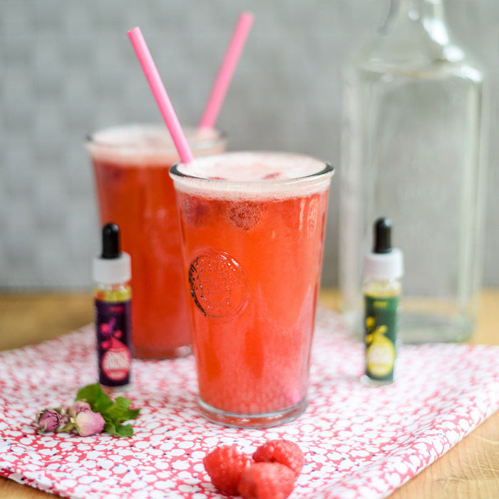 Raspberry gin fizz cocktail made with Mint and Rose Spice Drops
