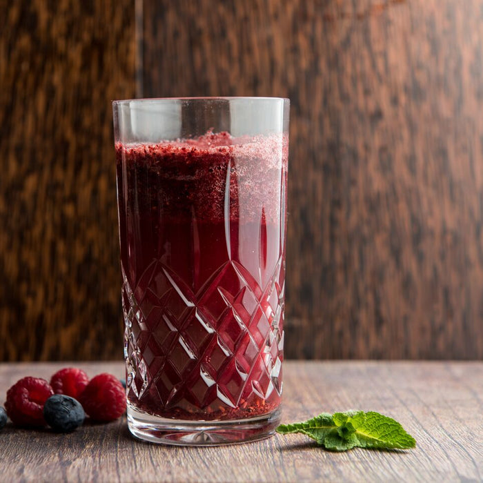 Summer berry cocktail made with Spice Drops and fresh mint