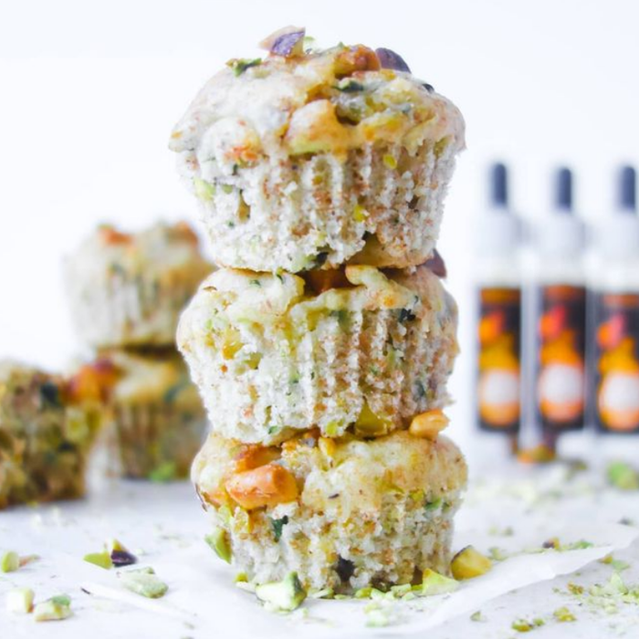 Courgette and pistachio muffins made with Vanilla, Cinnamon and Cardamom Spice Drops.