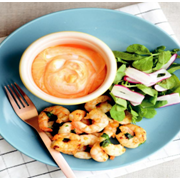 Tikka masala spiced prawns served with chilli and paprika yogurt dip