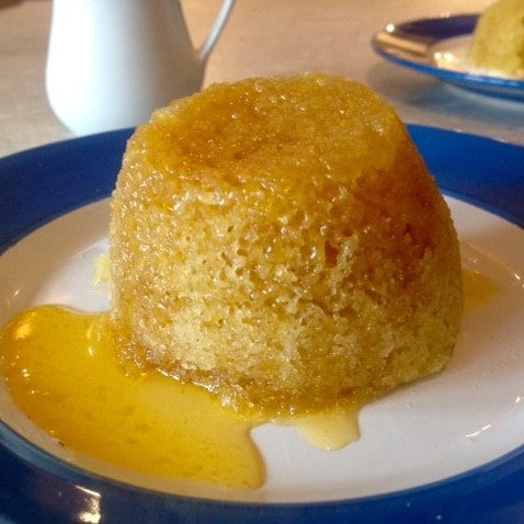 Lemongrass and ginger steamed pudding served with custard.