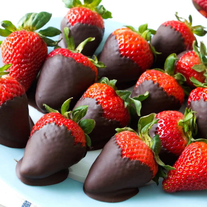 Rose chocolate covered strawberries made with Rose Spice Drops.