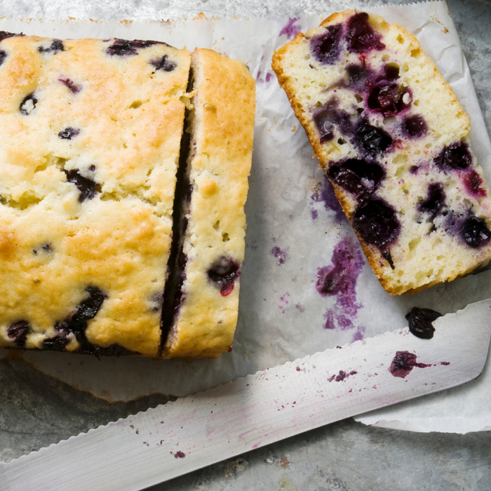 Lemon and blueberry loaf cake made with Lemon Zest Spice Drops.