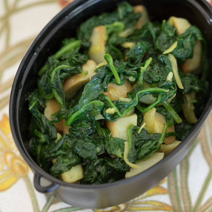 Saag aloo, a spiced potato and spinach side dish made with Spice Drops.